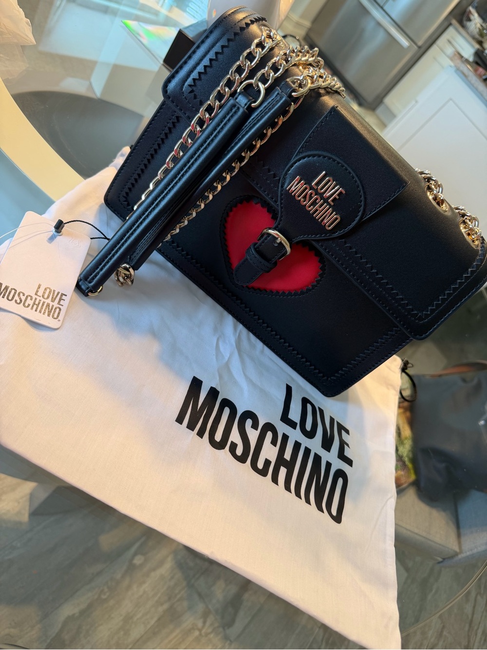 Love Moschino Black Shoulder Bag with Red Heart Accent